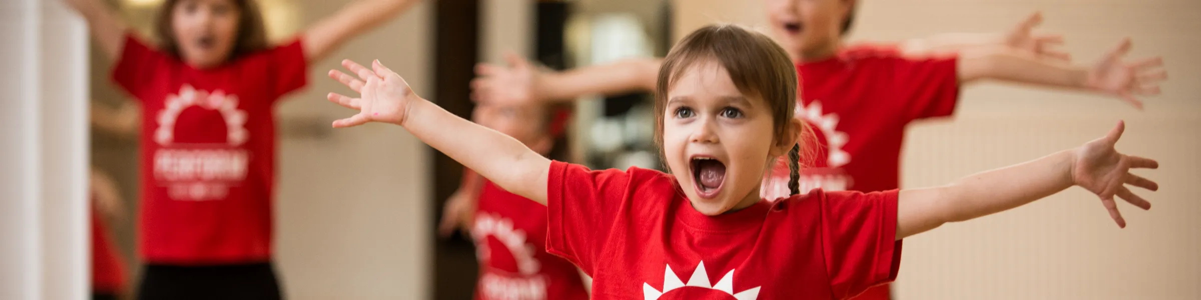 Children performing in a dance class